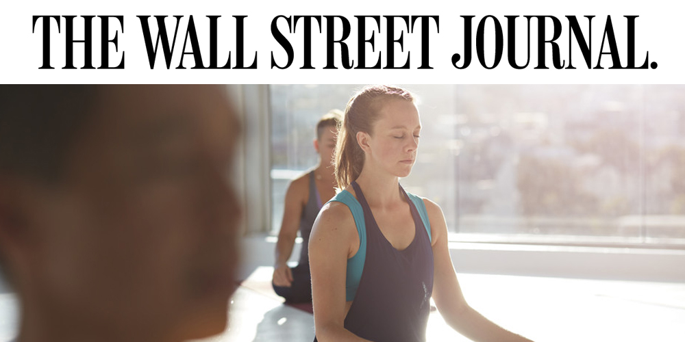 The Wall Street Journal logo and a person practicing yoga 