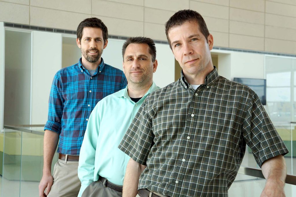 Dr. Michael Kilgard (front), Dr. Robert Rennaker and Dr. Seth Hays are three of the principal UT Dallas researchers behind the innovation of vagus nerve stimulation to treat a variety of neurological issues, including poor hand function after a stroke.